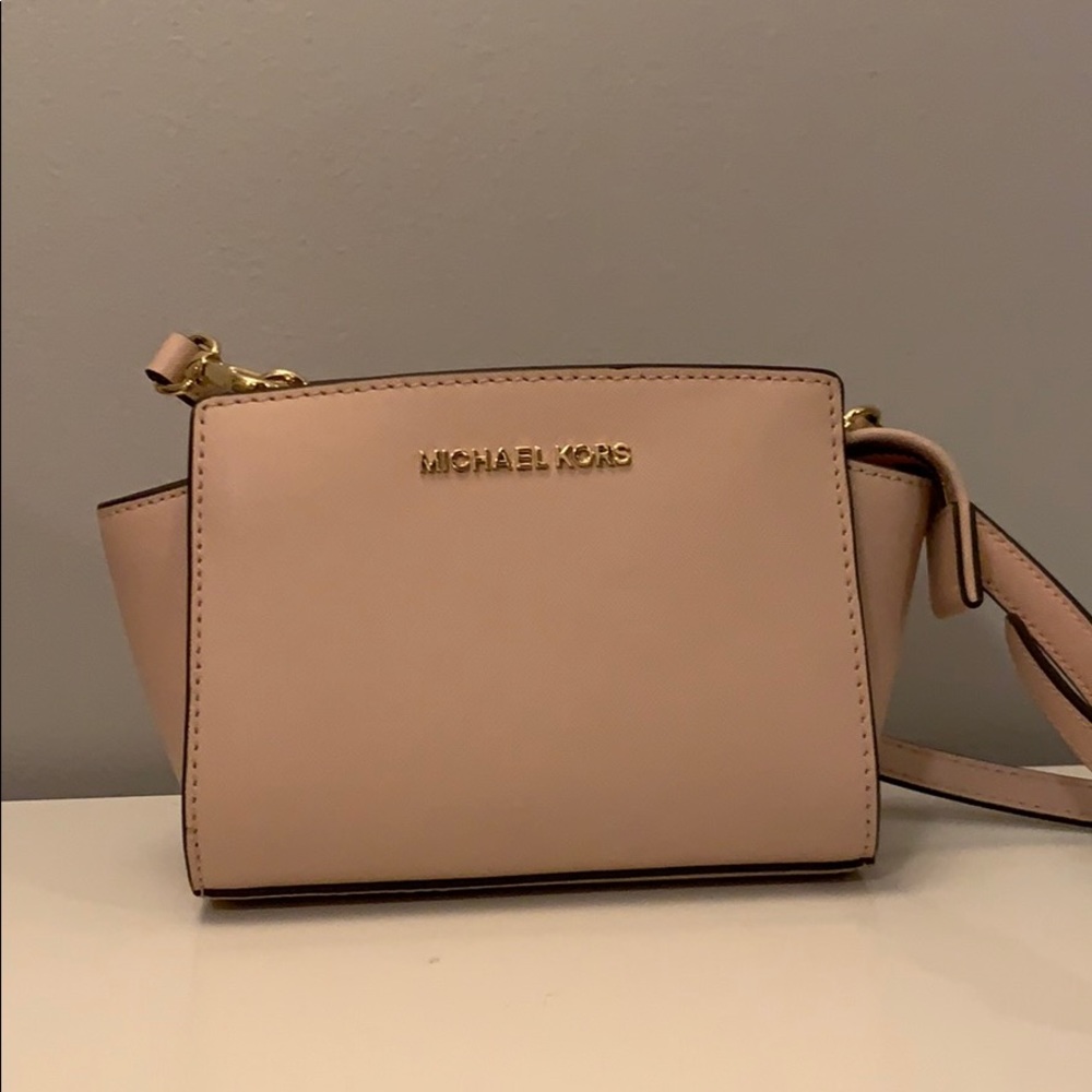 Baby pink Michael Kora mini crossbody